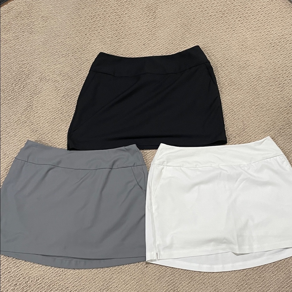 Lot of (3) ADIDAS golf skirts - Black, Gray, and White skorts